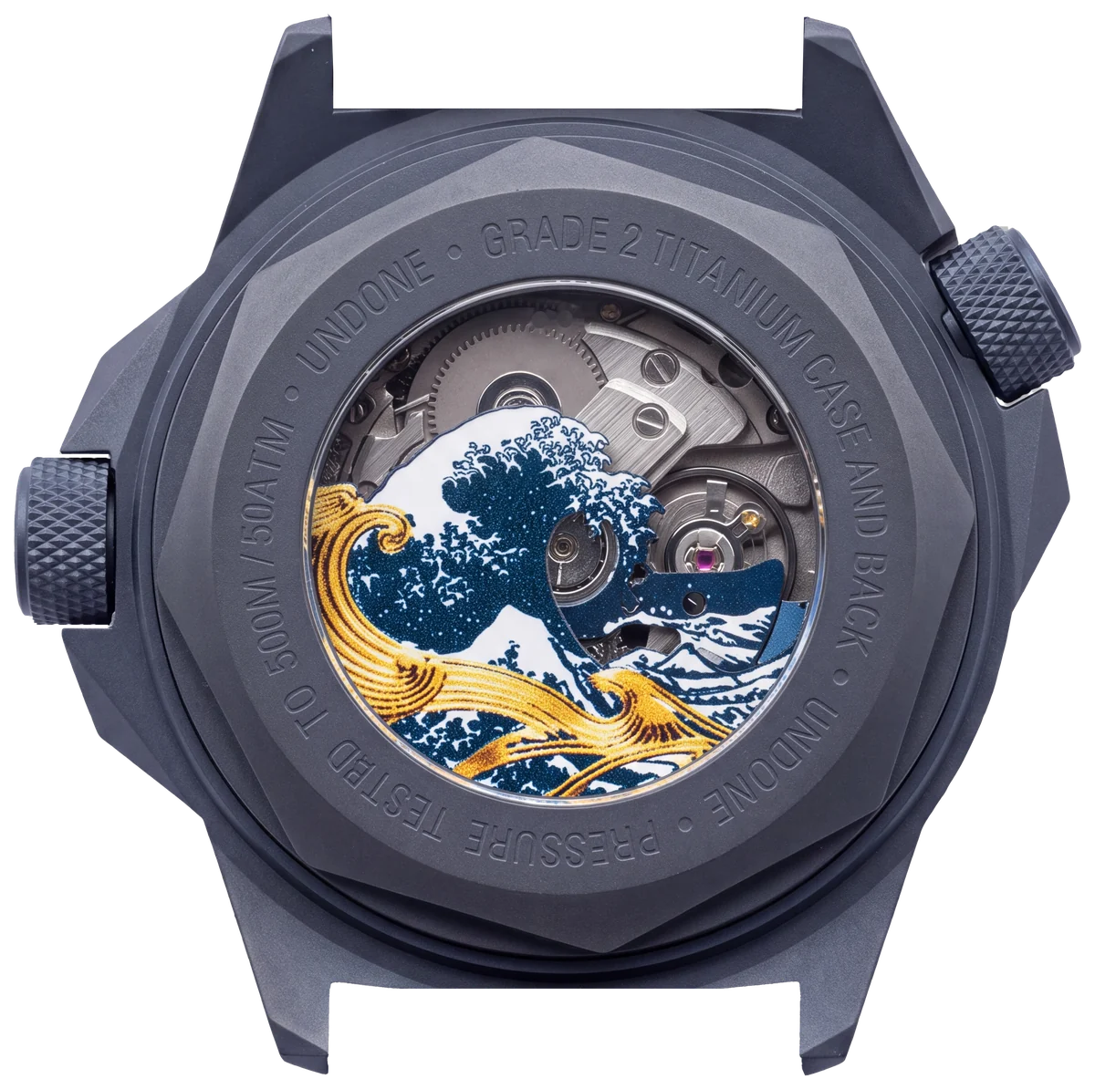 The Hokusai II caseback: Grade 2 titanium in IP Blue, open to the NH35 through the back glass, with the wave and gold on the rotor