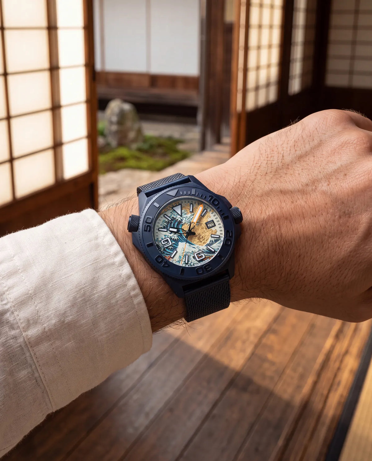 On the wrist, Cordura strap, beside shoji screens